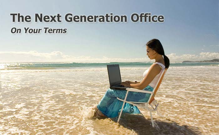 Woman at the seashore working on laptop